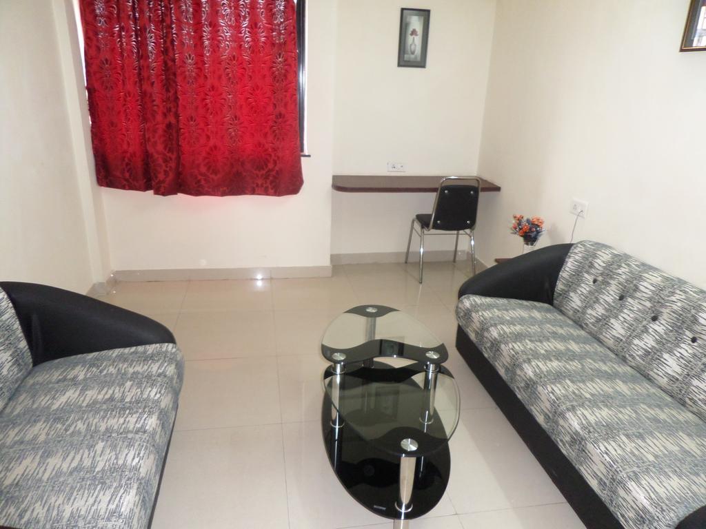 Cosmos Luxury Vimannagar Aparthotel Pune Room photo